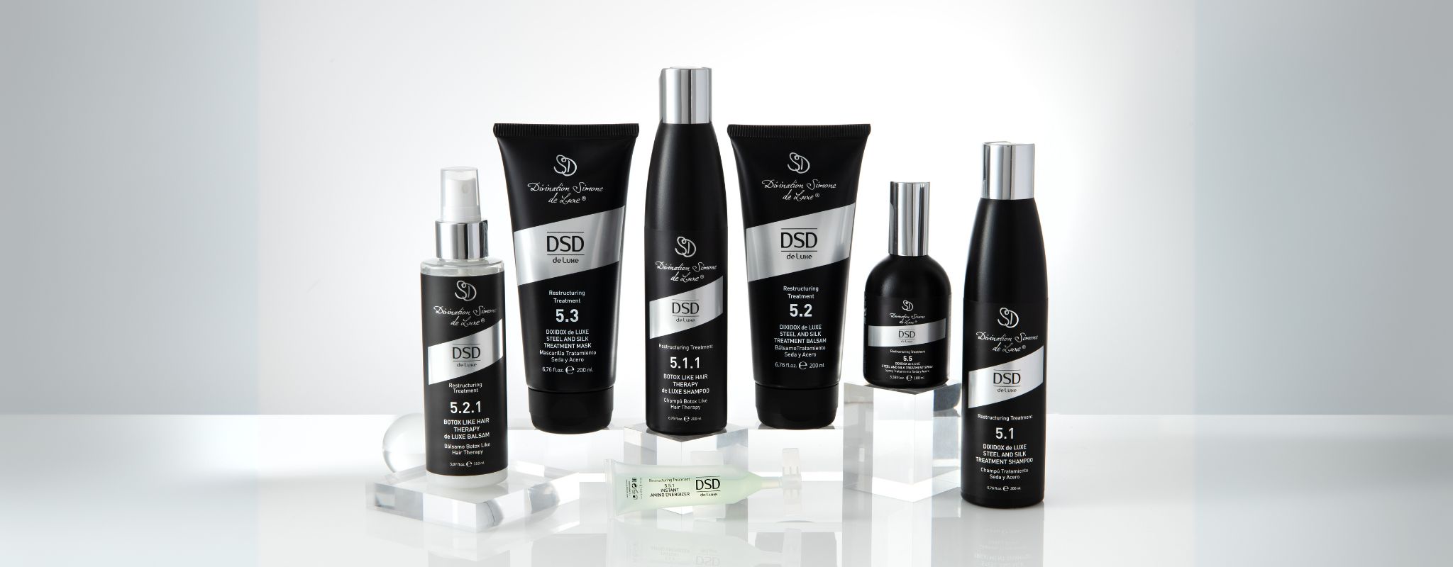 DSD de Luxe Line 5 Restructuring Collection for damaged and frizzy hair, featuring Botox Like Hair Therapy Shampoo, Steel and Silk Treatment Mask, and Botox Like Hair Therapy Balsam.